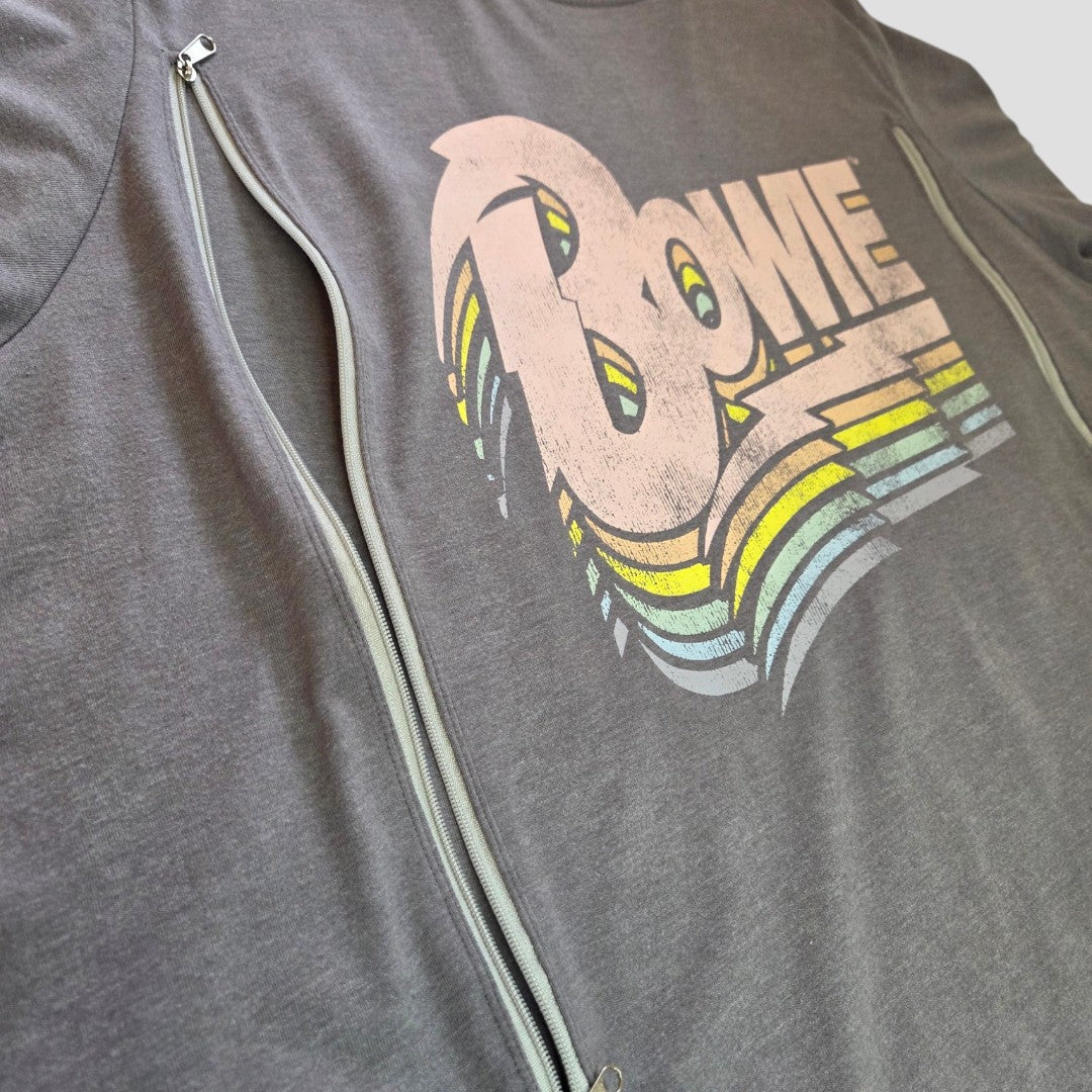 The Tu Upcycled Breastfeeding & Pumping Grey Pastel Bowie Band T-shirt UK26 features a retro pastel Bowie logo and side zippers—stylish, practical, and affordable nursing wear for breastfeeding moms.