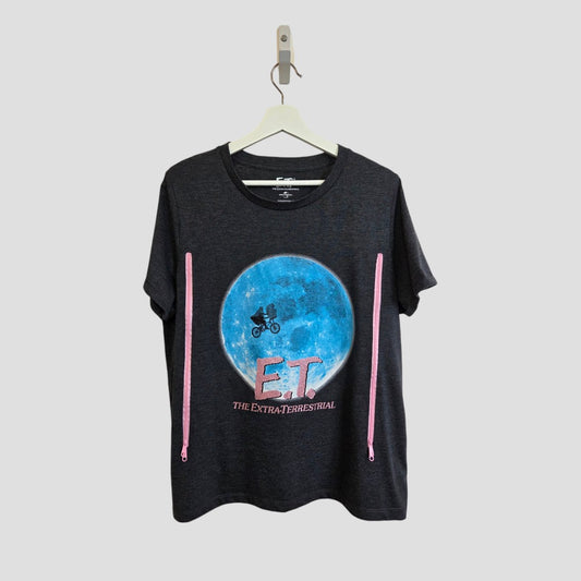 Universal's upcycled grey E.T. nursing & pumping t-shirt (UK18) features a blue moon and bicycle graphic with “E.T. The Extra-Terrestrial” in pink, crafted from eco-friendly materials.