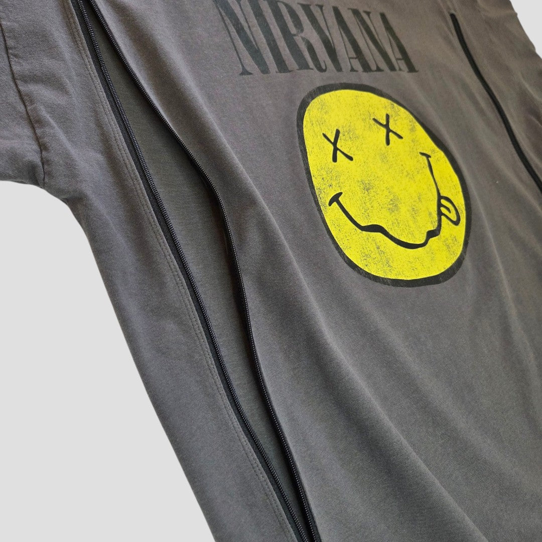 A close-up of an upcycled Primark Grey Nirvana Yellow Smile Band T-shirt (size S, UK10/12) with black zippers on both sides for easy breastfeeding or pumping—stylish and affordable nursing wear.