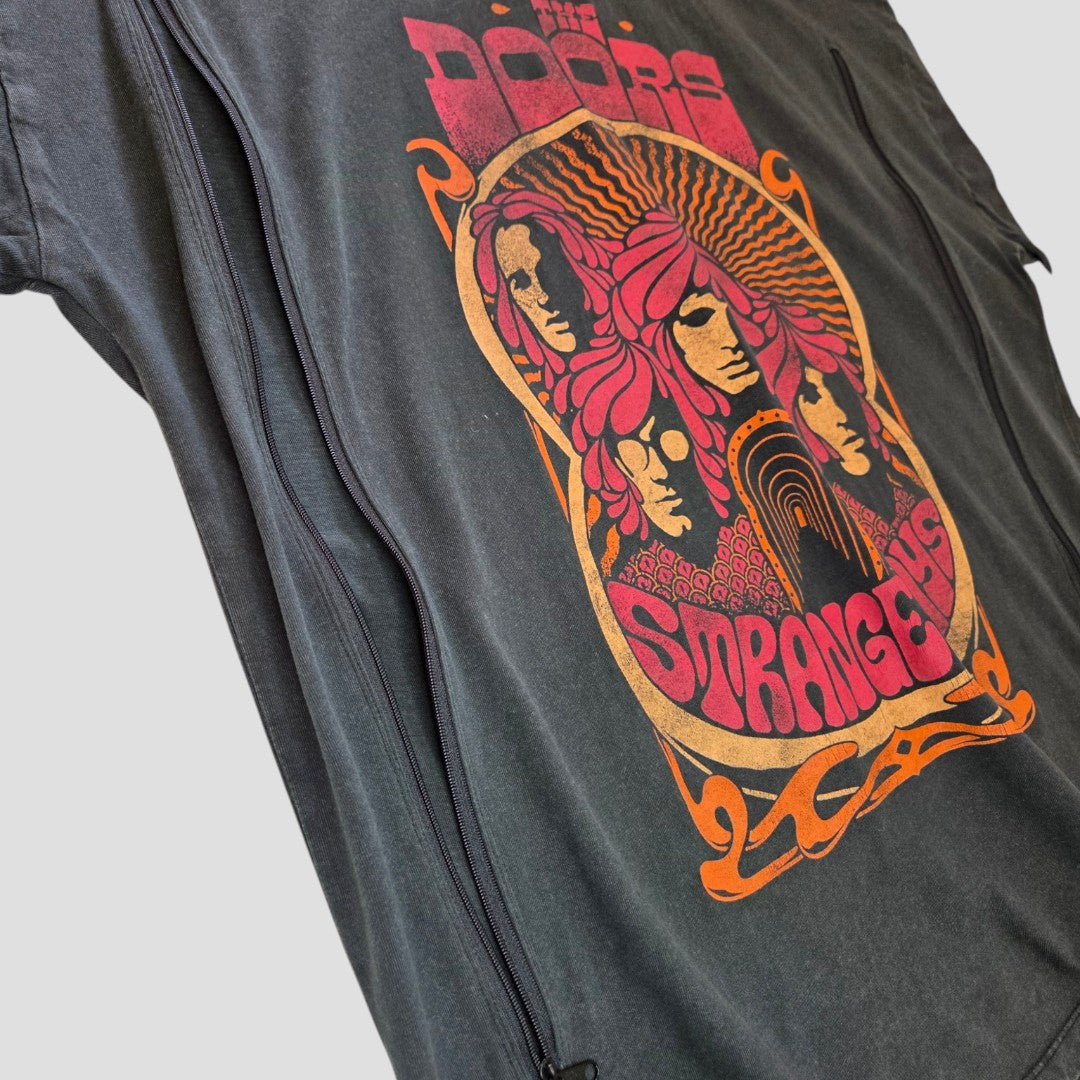 Affordable upcycled Primark oversized black band T-shirt (size M) featuring The Doors Strange Days artwork in orange and pink, with stylized portraits, retro patterns, bold "The Doors" and "Strangers" text. Suitable for breastfeeding & pumping.