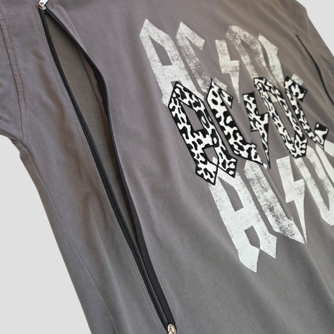 Close-up of the AC/DC Upcycled Breastfeeding & Pumping Grey Leopard XL Band t-shirt, featuring black and white leopard print “AC/DC” text and a side zipper opening for convenient nursing access.