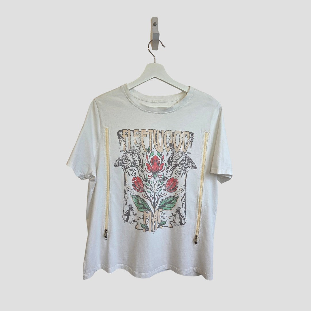 Upcycled Tu Cream Floral Fleetwood Band t-shirt UK16 features short sleeves, a floral and mushroom graphic, and two diagonal front zippers for easy nursing—stylish and practical breastfeeding & pumping wear.