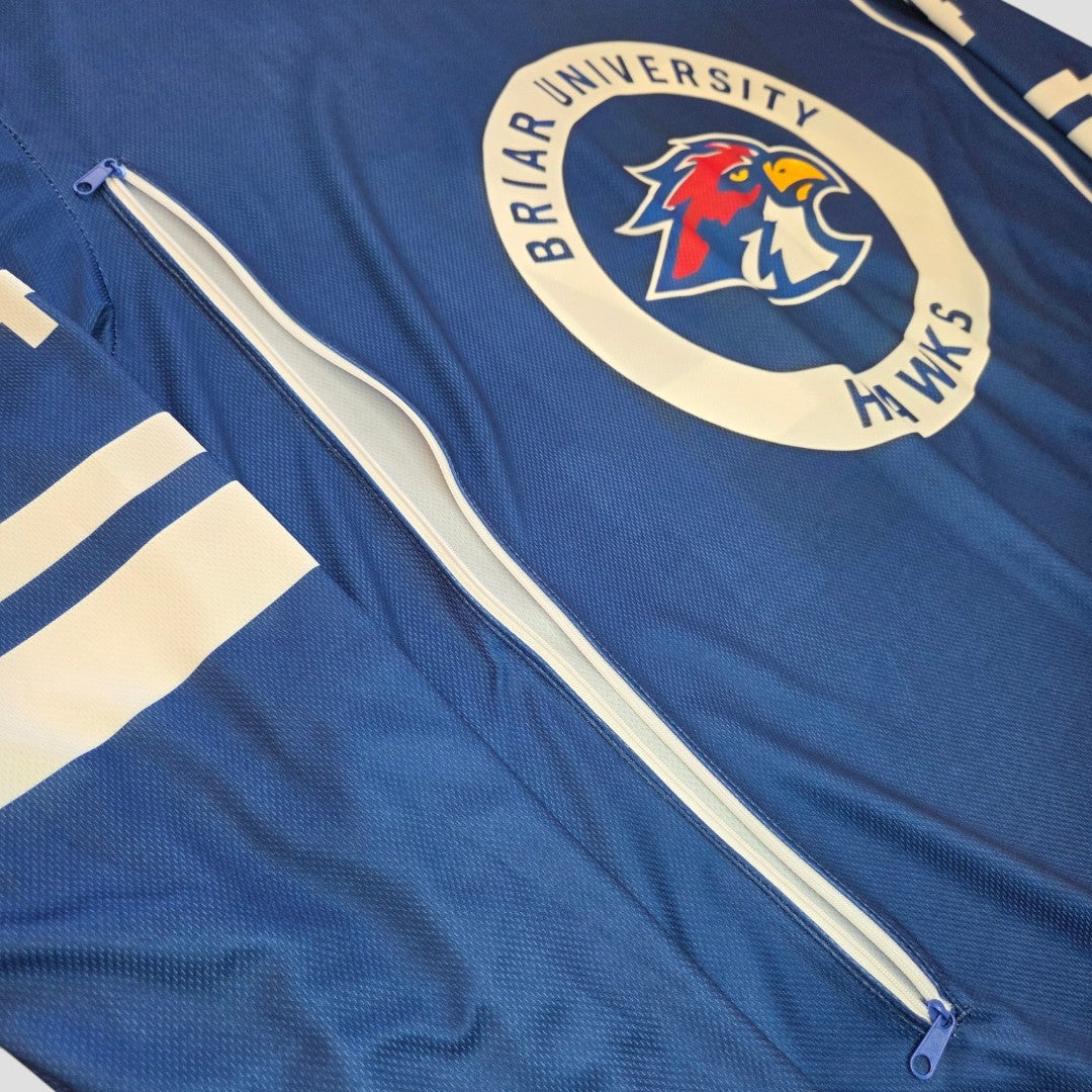 The Amazon Upcycled Breastfeeding & Pumping Blue Off Campus Garrett Graham Ice Hockey Jersey t-shirt XL features cream stripes, a zippered pocket, and a circular Briar University Hawks logo with a red and blue hawk head—ideal for affordable nursing wear.