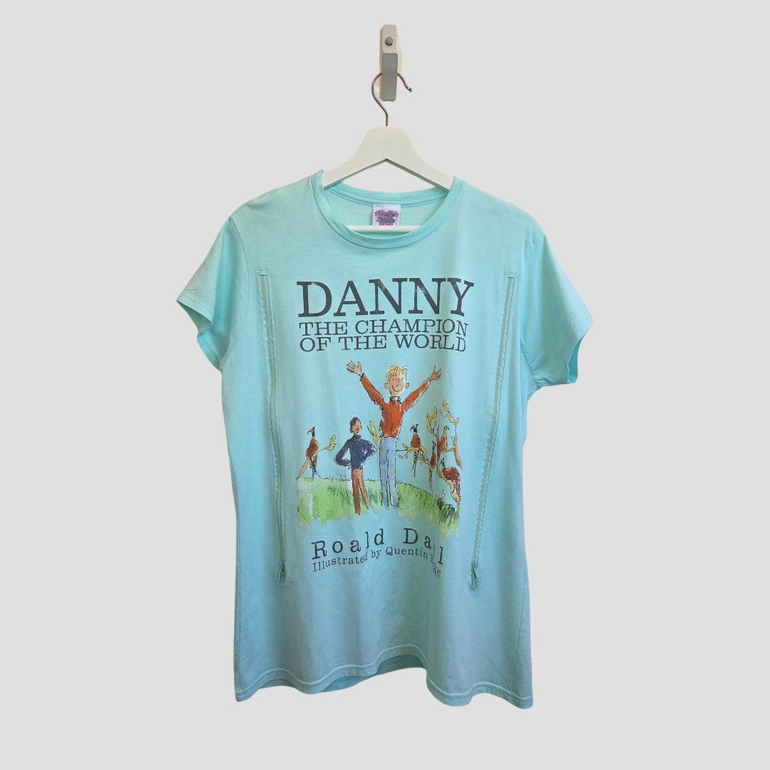 Certainly! Here’s the revised sentence using your product data: The Upcycled Breastfeeding (Nursing) & Pumping Danny Champion of the World T-shirt XL by Truffle Shuffle features a light blue design with Danny the Champion of the World text, illustrations of characters, and Roald Dahl, illustrated by Quentin Blake printed below—an affordable nursing wear option perfect for new mothers seeking both comfort and literary charm.