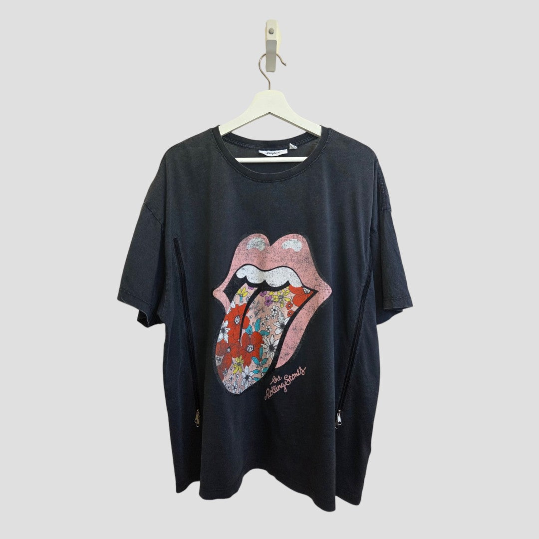 Upcycled Breastfeeding (Nursing) & Pumping Grey Floral The Rolling Stones Band t-shirt XL by Next, featuring a bold graphic of an open mouth and tongue adorned with colorful floral patterns. "The Rolling Stones" text accents the design near the bottom, making this eco-friendly tee a sustainable style choice for those who want to stand out.