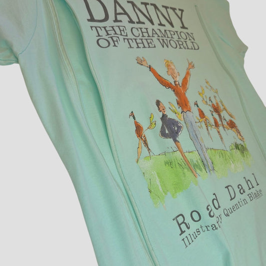 Here’s a revised version using your product data: The Truffle Shuffle Upcycled Breastfeeding (Nursing) & Pumping Danny Champion of the World t-shirt XL (100598) is a light blue eco-friendly garment featuring an illustration by Quentin Blake and text from Roald Dahl’s "Danny the Champion of the World." Part of our nursing clothing collection, it depicts characters standing on grass with arms raised in celebration.