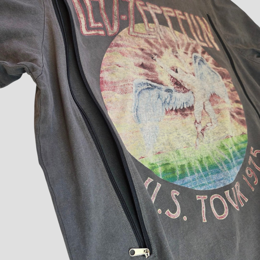 A close-up of the Amplified Upcycled Breastfeeding (Nursing) & Pumping Grey 1975 Led Zeppelin Band t-shirt (size L, style 100562), featuring a faded tour graphic and a vertical zipper sewn through the design for a unique, eco-friendly nursing twist.