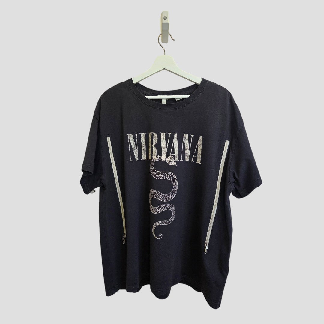 Upcycled Breastfeeding (Nursing) & Pumping Grey/Cream Nirvana Snake Band t-shirt XL by H&M, shown on a hanger against a light gray background, features a bold snake graphic at the center and convenient vertical zippers on both sides for easy nursing access—an affordable and stylish option for breastfeeding apparel.