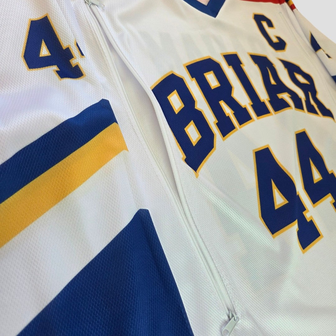 Close-up of the Upcycled Breastfeeding (Nursing) & Pumping White Off Campus Ice Hockey Jersey t-shirt XL by Amazon, featuring blue and yellow stripes, the number 44, and the name BRIAR in blue and yellow letters with a C for captain—designed as an eco-friendly alternative to traditional materials.