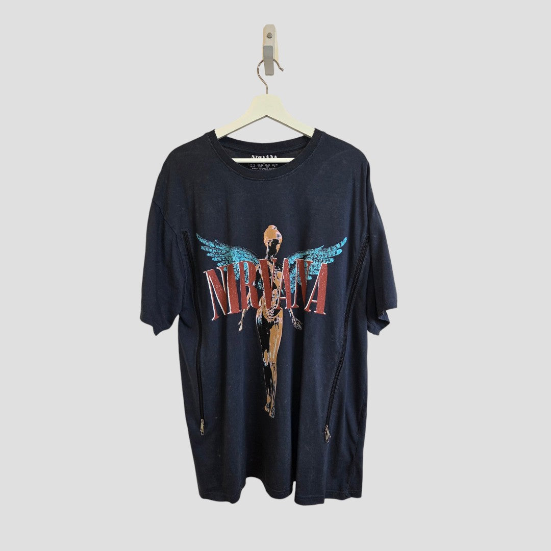 Primark Upcycled Breastfeeding (Nursing) & Pumping Nirvana Turquoise Angel t-shirt in size L (UK14/16), featuring an anatomical angel graphic and red text, designed for affordable nursing wear; displayed on a beige hanger against a plain light gray background.