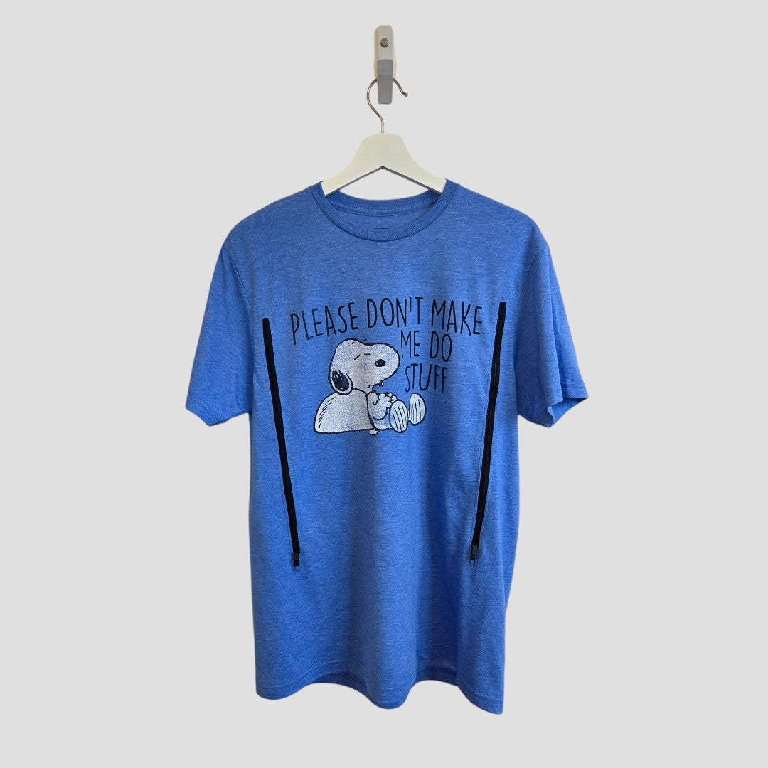 Peanuts Upcycled Breastfeeding (Nursing) & Pumping Blue Snoopy t-shirt (size M, 100605) is shown hanging on a hanger. The front features Snoopy holding a cup with the text “PLEASE DONT MAKE ME DO STUFF.” This eco-friendly and affordable tee is both fun and sustainable—ideal for everyday comfort.
