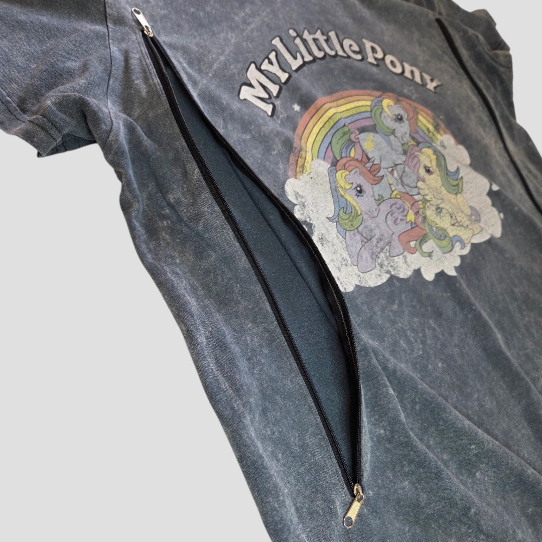 The Upcycled Breastfeeding & Pumping Grey My Little Pony T-shirt UK14 (100600) by Primark is an affordable and eco-friendly nursing top, featuring a diagonal zipper across the front for easy breastfeeding or pumping. Decorated with pastel ponies and a rainbow graphic, this stylish shirt is perfect for moms who want comfort and convenience without compromising on cuteness.