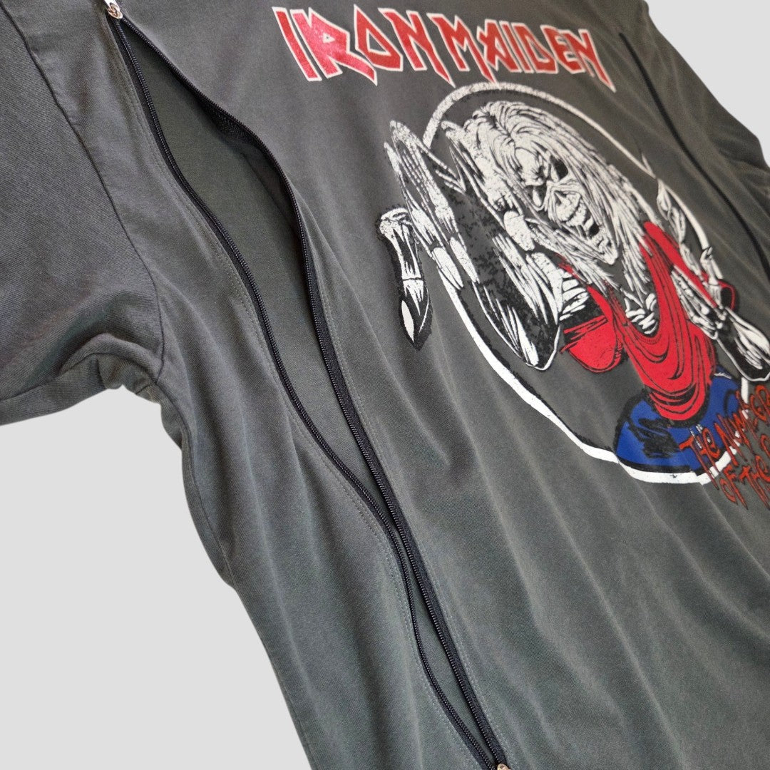 A close-up of a dark gray George Upcycled Breastfeeding (Nursing) & Pumping Grey Iron Maiden Band t-shirt UK22 (100618), showcasing a bold graphic with red lettering and two parallel zippers running vertically on the front—an edgy blend of rock-inspired style and practical breastfeeding clothing functionality.