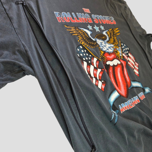 Upcycled from a Rolling Stones band t-shirt, this grey XL nursing and pumping top by Next features an eagle, stars, U.S. flags, and the iconic tongue logo graphic. Designed with a visible side zipper for easy breastfeeding access—ideal for those seeking affordable nursing clothing. The text reads THE ROLLING STONES and AMERICAN UR.