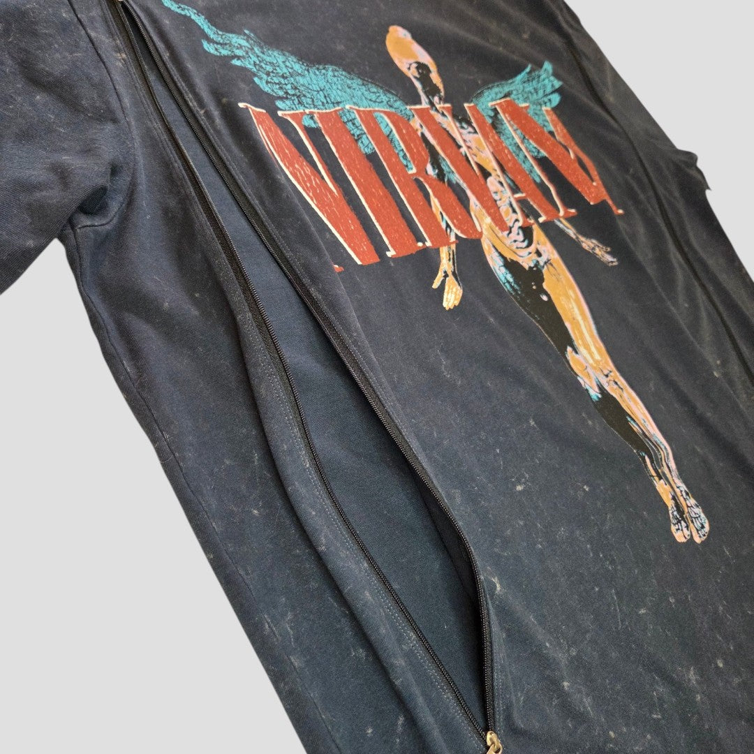 An upcycled Primark oversized Nirvana band t-shirt in grey, featuring a turquoise angel inspired by the In Utero album cover and a diagonal zipper across the front, designed as stylish and affordable nursing clothes for easy breastfeeding and pumping access—available in size XL (UK18/20).