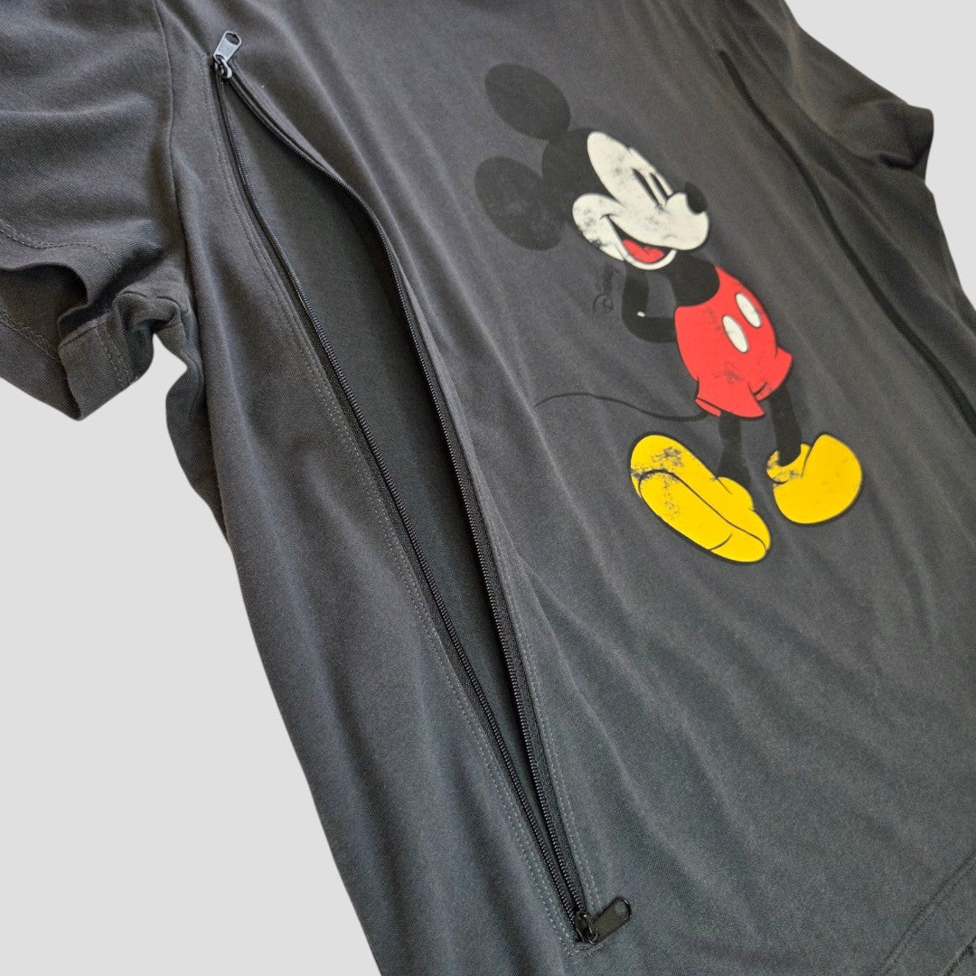 Upcycled H&M Breastfeeding (Nursing) & Pumping Grey Mickey Mouse t-shirt in size L (100533), laid flat on a light background. The shirt features a playful Mickey Mouse graphic and a diagonal zipper partially unzipped across the front for easy nursing access, providing an affordable and functional option for breastfeeding clothing.