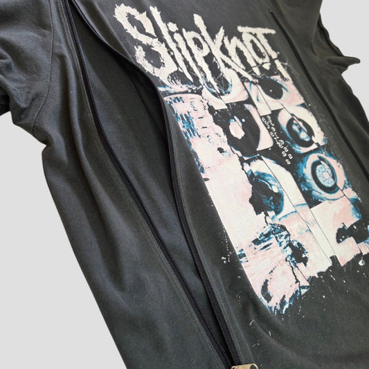 An Upcycled Breastfeeding (Nursing) & Pumping Slipknot Eyeless Band t-shirt L (100590) by Amplified, designed for both style and practicality, sits beneath a partially unzipped black jacket. This affordable nursing wear features a striking graphic of abstract shapes and distressed white text—making it the perfect choice for Slipknot fans seeking breastfeeding clothing that doesn’t compromise on edge or comfort.