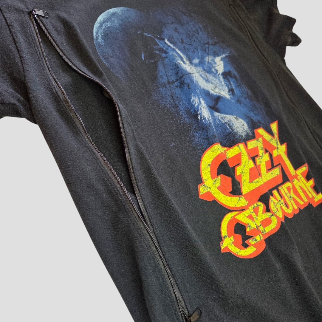Upcycled from a Gildan Ozzy Osbourne band T-shirt, this black nursing and pumping top (size L) features a blue-toned image with bold yellow-red Ozzy Osbourne text. Designed for fans seeking affordable breastfeeding clothing, it offers two discreet black zippers running vertically along each side of the front for convenient nursing access.