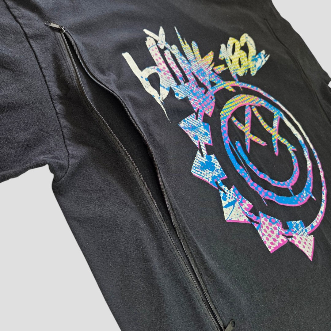 Upcycled Breastfeeding (Nursing) & Pumping Black Colourful Blink-182 Smile Band t-shirt XXL by Blink-182—a stylish and affordable black tee showcasing a vibrant, distressed Blink-182 smiley face graphic with a discreet black zipper along one side for easy nursing, making it a perfect choice for breastfeeding moms.