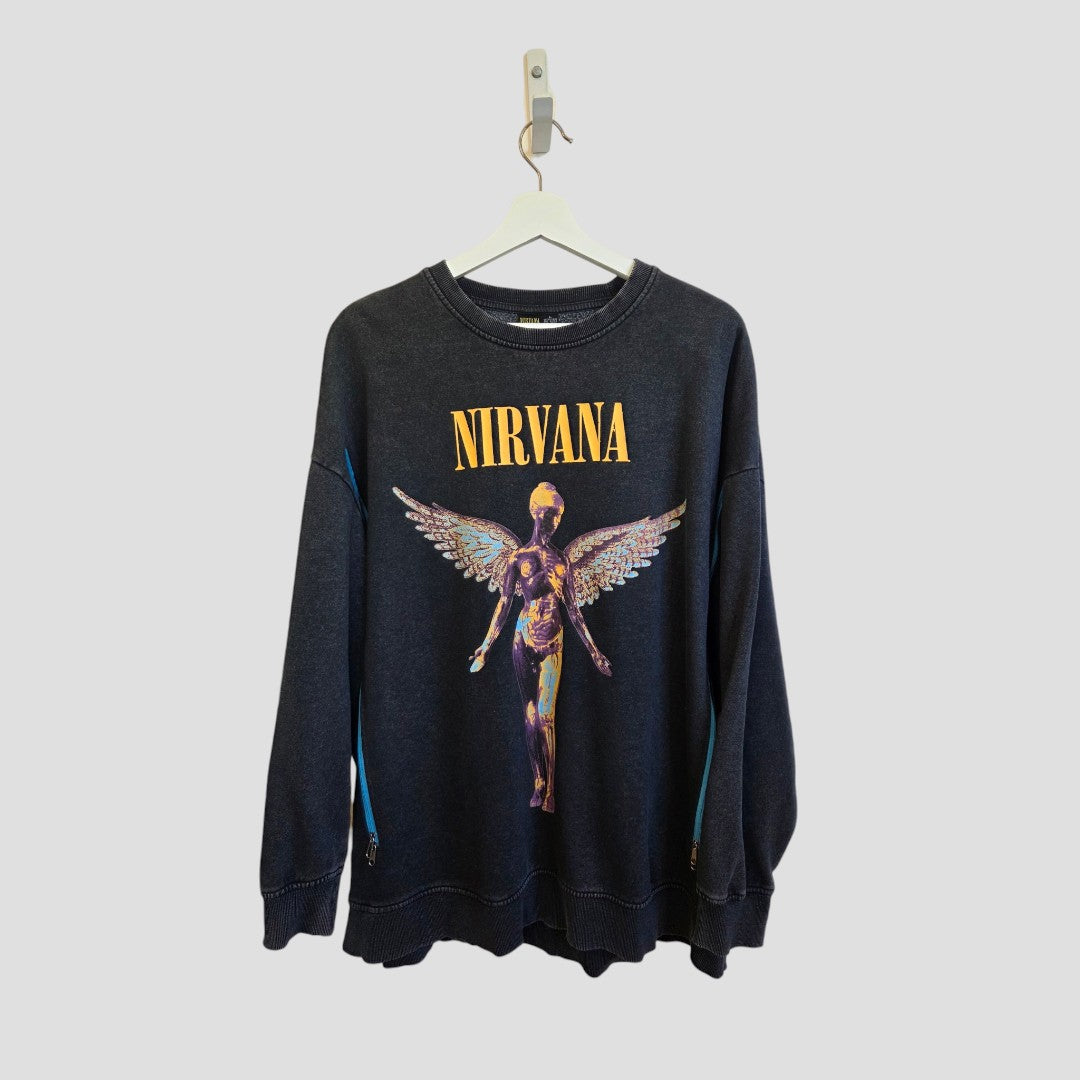 A grey and orange Nirvana Angel Band sweatshirt from Primark, upcycled for breastfeeding (nursing) and pumping convenience, features the iconic winged anatomical figure on the front. Displayed hanging on a white hanger against a plain light gray background, this affordable size L (UK14/16) piece effortlessly combines comfort with everyday style—making it a practical choice for nursing mothers.