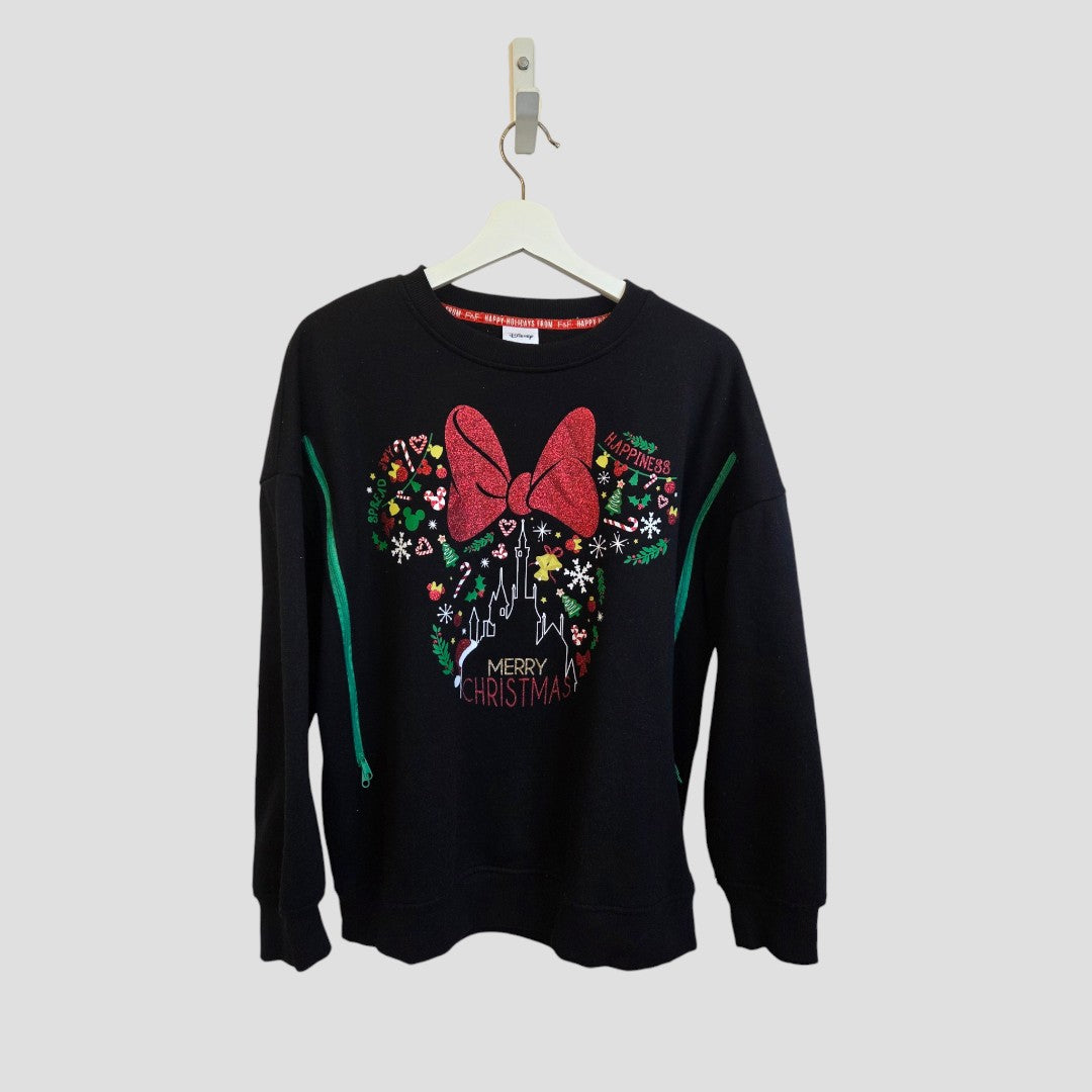 Disney Upcycled Breastfeeding (Nursing) & Pumping Black Christmas sweatshirt UK10 (100640), featuring a large red glitter bow, colorful festive decorations, and ‘Merry Christmas’ text on the front—designed for comfort and convenience as stylish nursing clothing—hanging on a white hanger against a plain gray background.