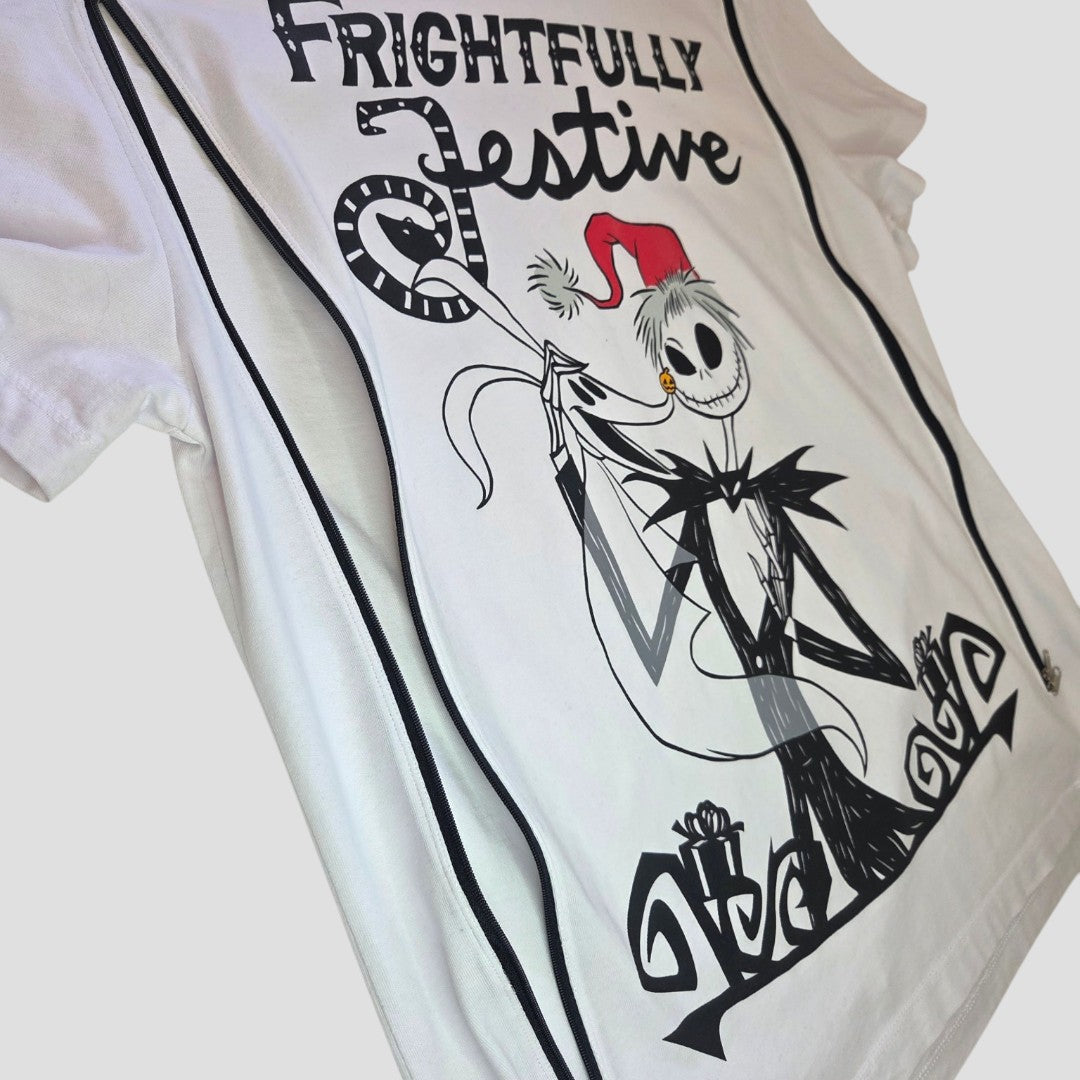 Introducing the Primark Upcycled Breastfeeding (Nursing) & Pumping The Nightmare Before Christmas Festive t-shirt (L): an eco-friendly white tee featuring Jack Skellington in a Santa hat, framed by black vertical stripes and the “Frightfully Festive” text in bold black. This sustainable design is perfect for fans who want to celebrate their frightful holiday spirit while supporting both nursing and upcycling.