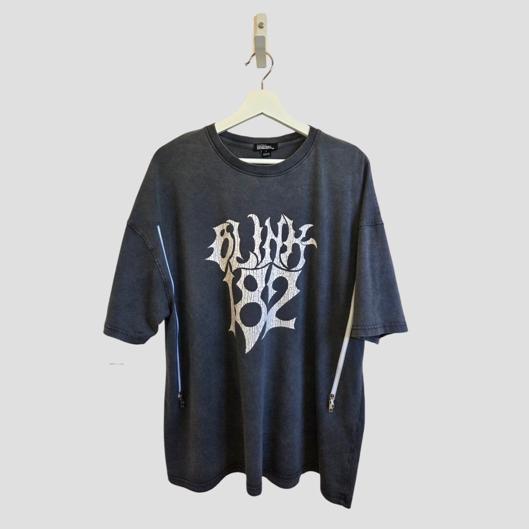 Grey oversized Upcycled Breastfeeding (Nursing) & Pumping Grey Blink-182 Oversized Band t-shirt S (100622) with a white Blink-182 band logo on the chest and vertical zippers along the sides.