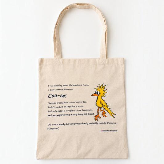 Natural-colored recycled cotton Wonky Mummy eco tote bag featuring a cartoon of a disheveled yellow bird and text describing the struggles of postpartum life.